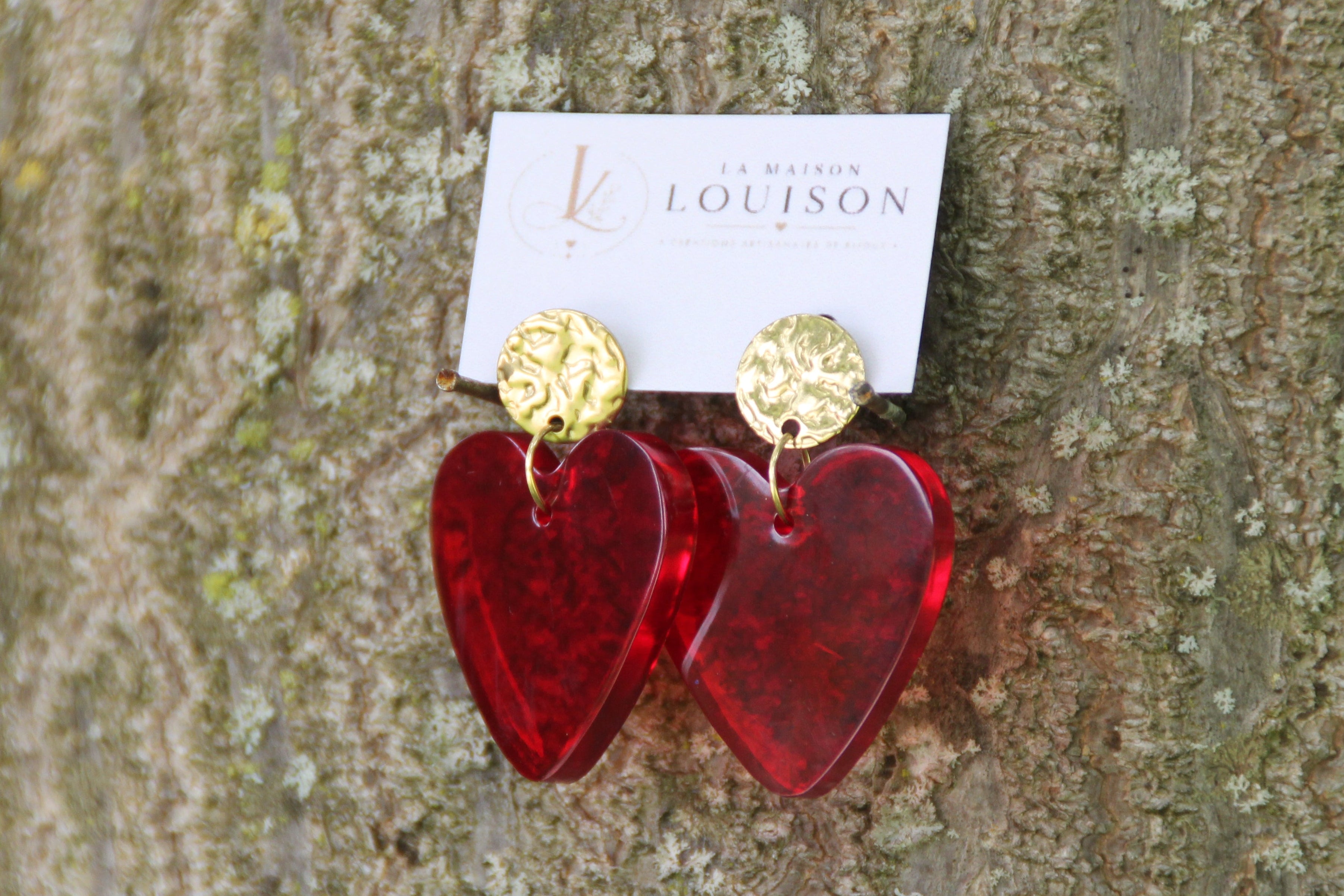 Boucles cœurs en résine